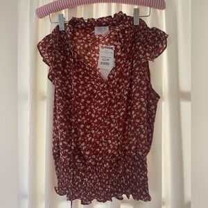 Sleeveless floral blouse